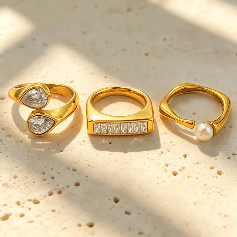 Ultra 3 Ring Stack Set three gold rings stacked on stone The Gold Collective
