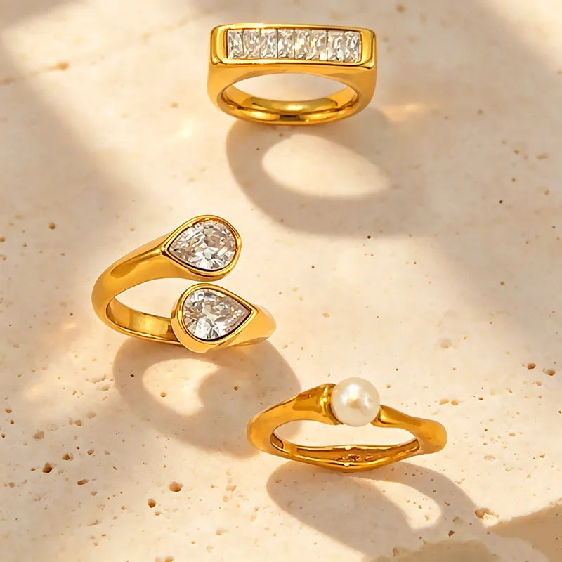 Ultra 3 Ring Stack Set individual gold rings laid flat on stone South Africa