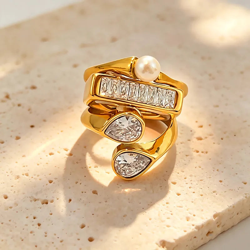 Ultra 3 Ring Stack Set gold baguette zircon and pearl rings overhead view
