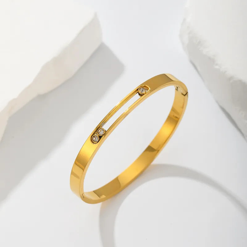 Mila Luxe Bangle in gold with sliding crystal groove detail, South Africa