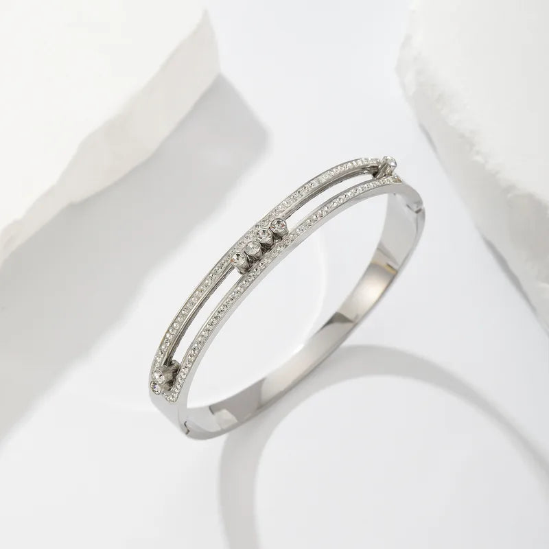 Sasha Luxe Bangle in gold with rhinestone double-rail design, South Africa