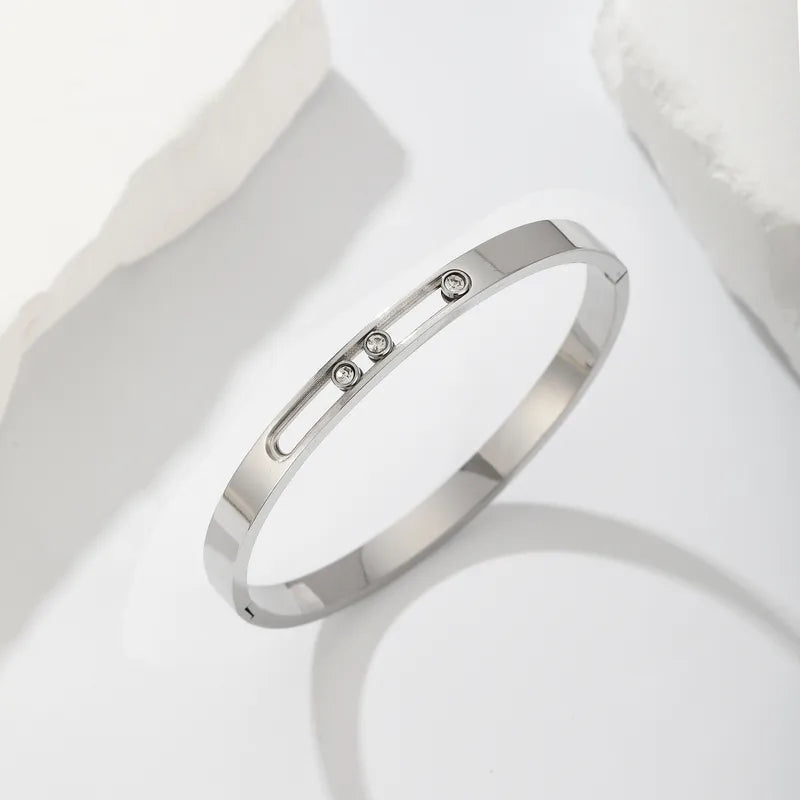 Mila Luxe Bangle in silver with sliding crystal groove detail, South Africa